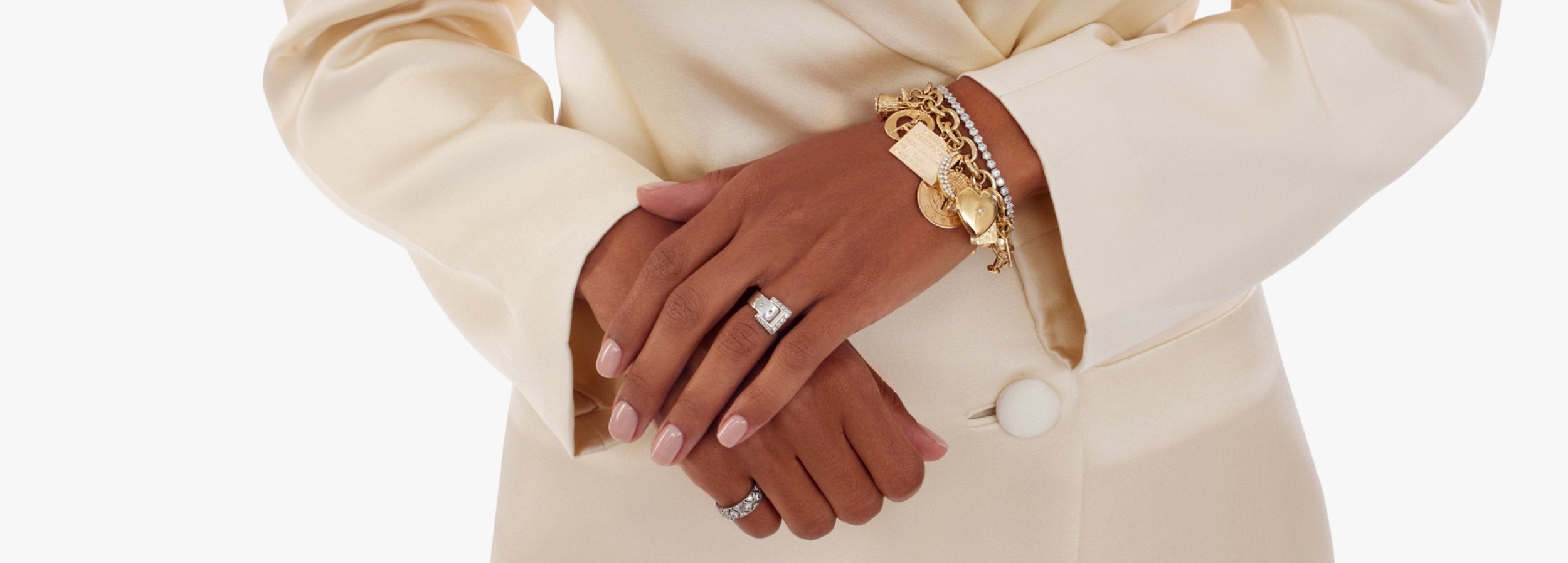 new bride wearing charm bracelet